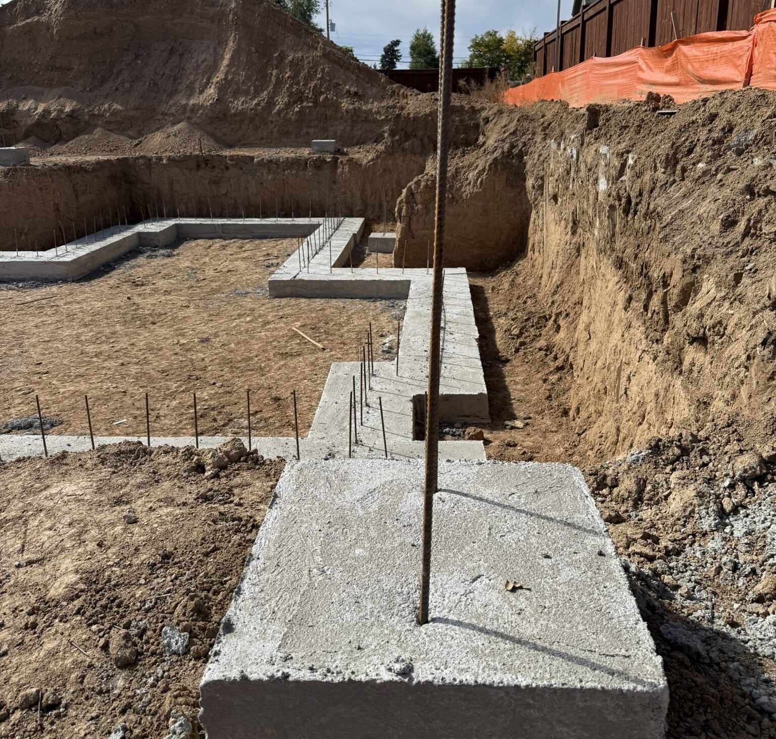 Mountainside Land Services prepping space for retaining wall.